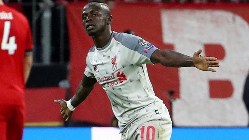 Le Sénégalais Sadio Mané fête le premier de ses deux buts pour Liverpool contre le Bayern Munich, le 13 mars 2019. © Michael Dalder/Reuters